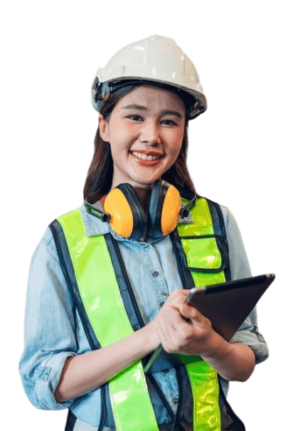 Female construction worker in safety gear smiling while holding a tablet.